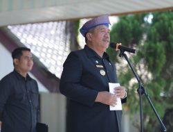 Bupati Gunakan Tanjak Melayu Pimpin Hardiknas di Kabupaten Asahan